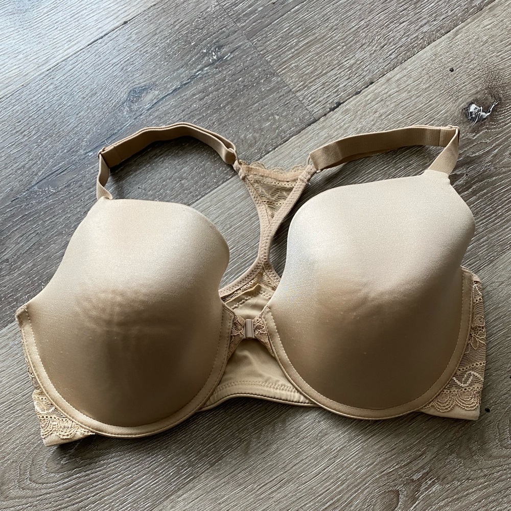 Racerback bra.  Front closure.  Never worn and in good condition